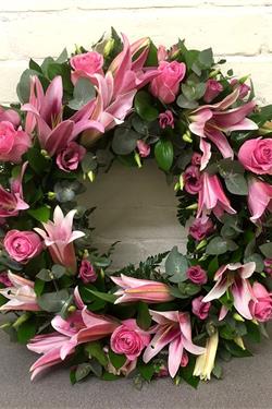 Pink lily funeral wreath